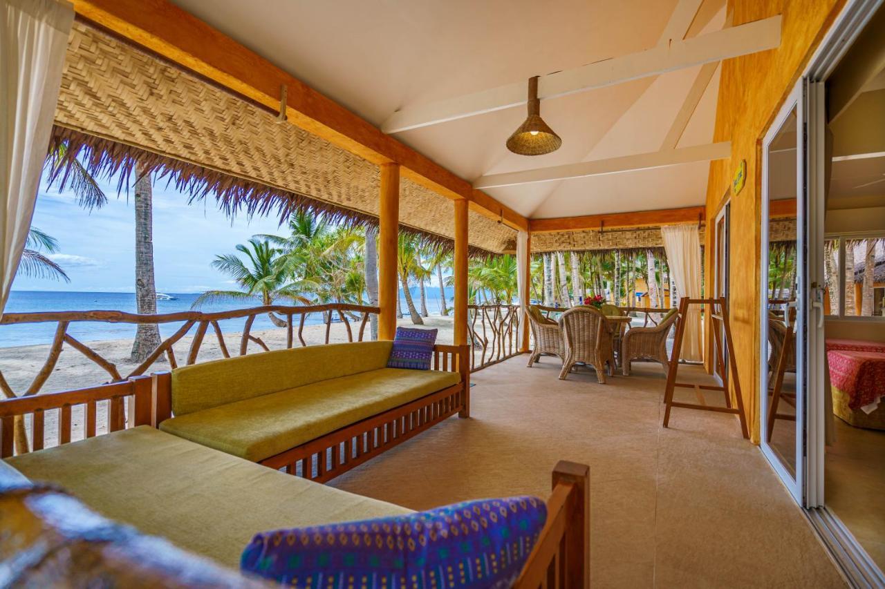 Coco Grove Beach Resort, Siquijor Island Екстер'єр фото A view of the beach from the hotel