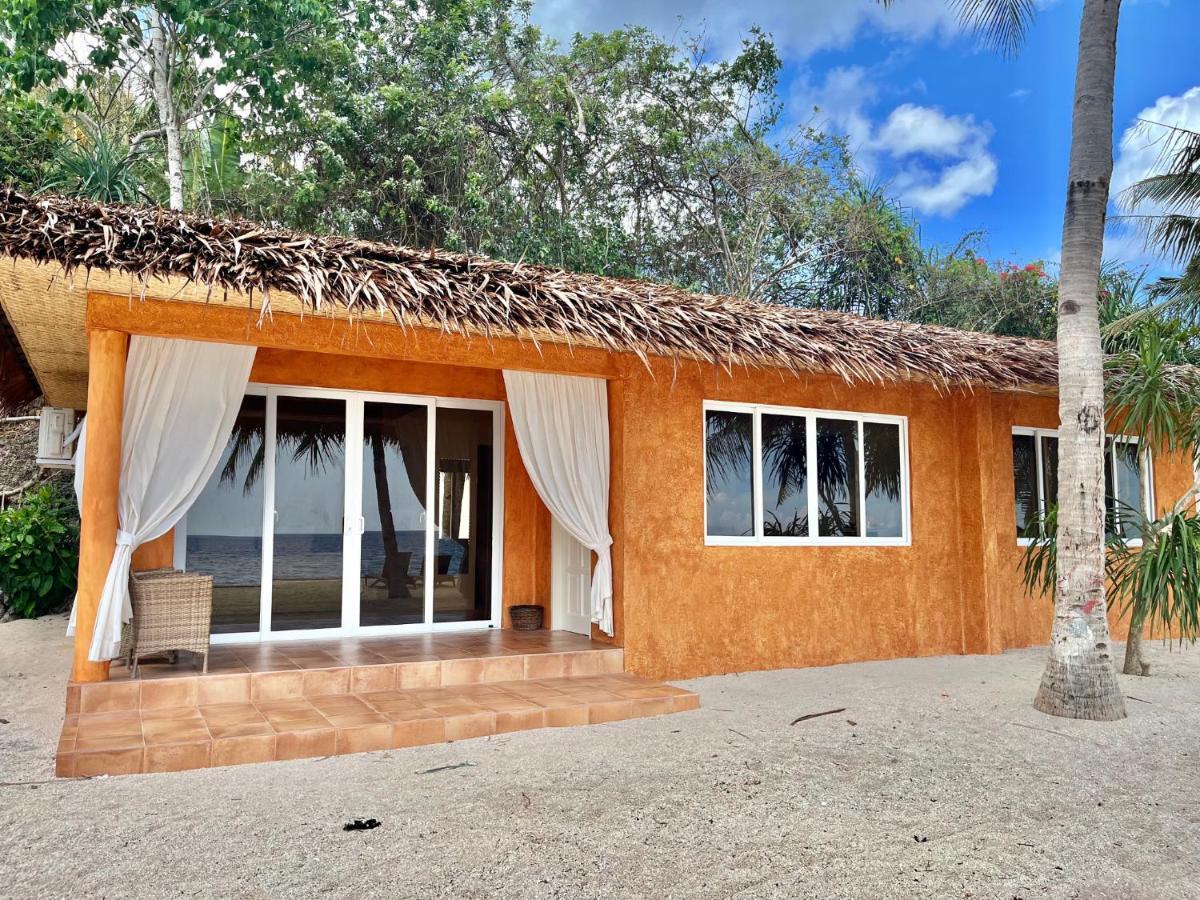 Coco Grove Beach Resort, Siquijor Island Екстер'єр фото A beach villa at the resort