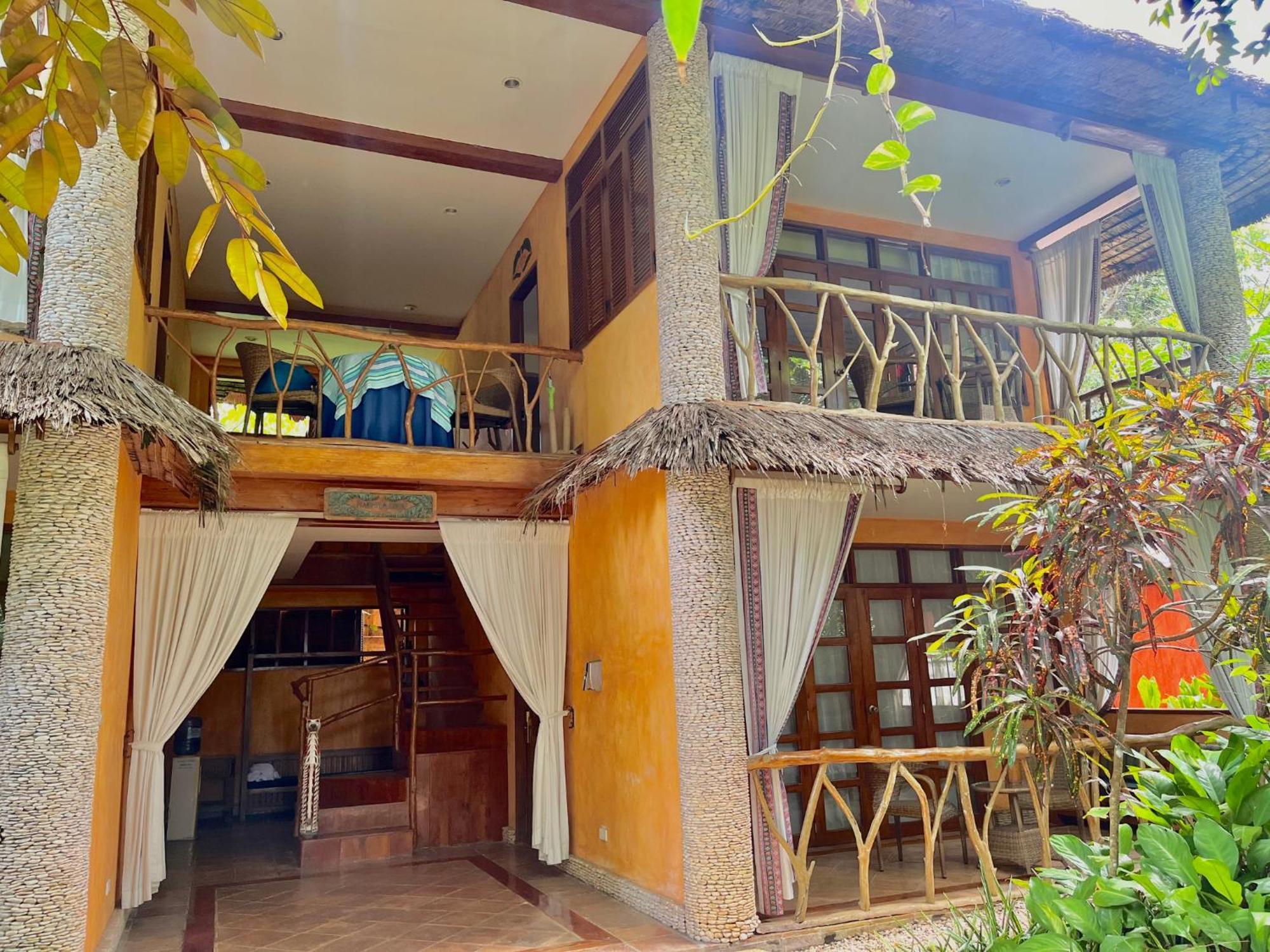 Coco Grove Beach Resort, Siquijor Island Екстер'єр фото A villa at the resort